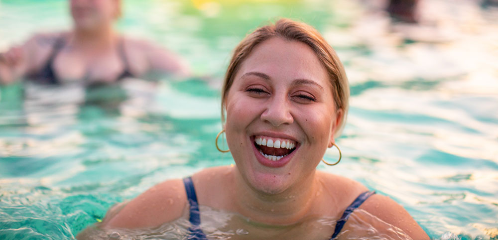 Smiling lady in pool