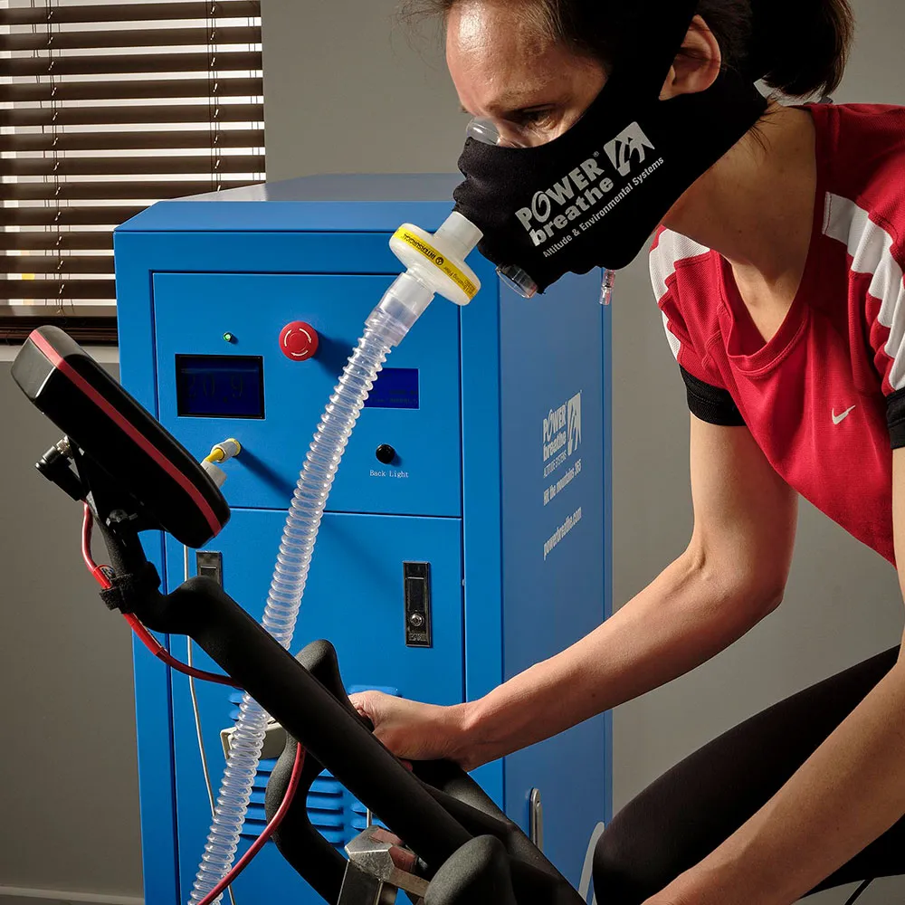 Woman using riding a bike in a PBAES semi permanent room