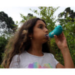 Young girl using a Shaker Deluxe Kids