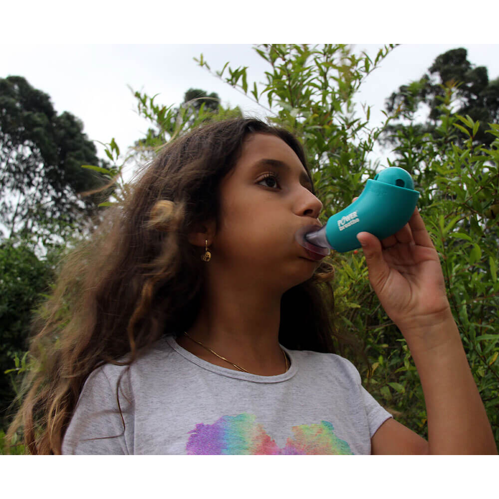 Young girl using a Shaker Deluxe Kids