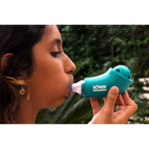 Side view of a girl using the Shaker Deluxe kids.