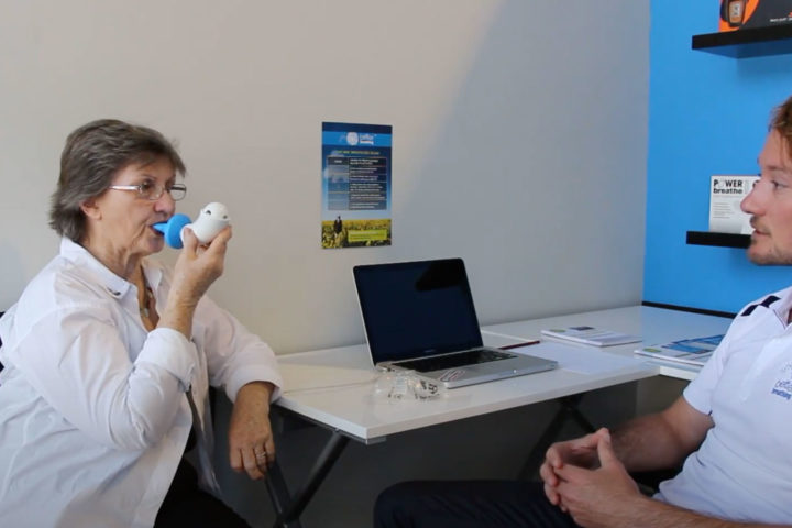 lady using Shaker device to clear lungs