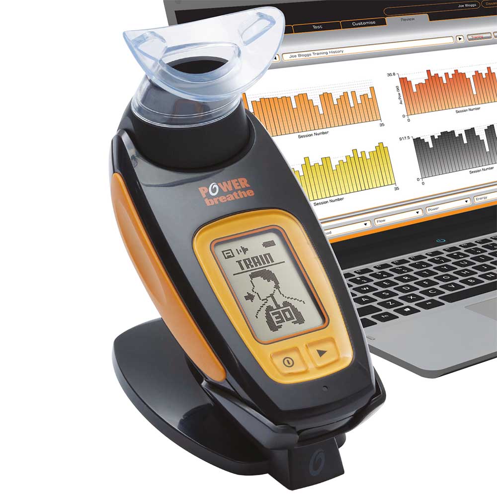 The POWERbreathe K5 offers a professional level of breathing training, testing and monitoring. Shows a partial laptop next to it.