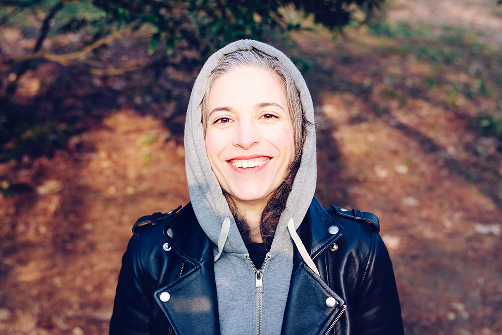 Lady smiling outdoors