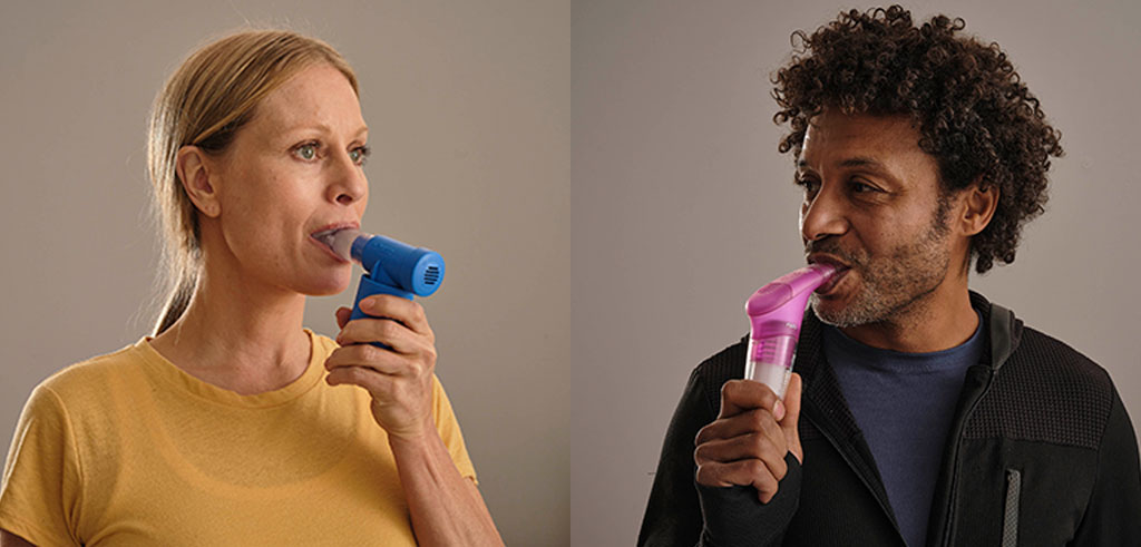 lady using powerbreathe classic and man using powerbreathe plus