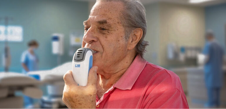 Older adult using POWERbreathe K3 IMST device to lower blood pressure naturally