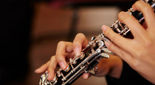 person playing a wind instrument