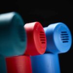 close up Back view of 3 of the Classic fanned out with a black background.