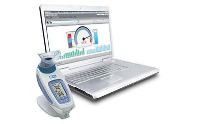 K-Series device show in front of a Macbook, showing Breathe-Link software.