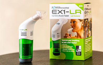 The EX1 EMT device standing in front of the packaging.