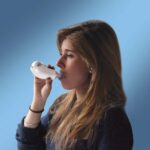 A woman using a Shaker Medic Plus