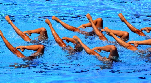 Effects of four weeks of inspiratory muscle training with different resistance modalities on pulmonary function and specialized athletic ability in synchronized swimmers: a randomised trial